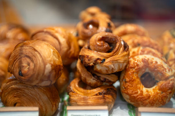 istock Freshly baked pastries is displayed on a store window tray in a bakery. 2177545364