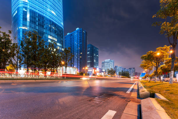 the light trails on the modern building background in shanghai china.