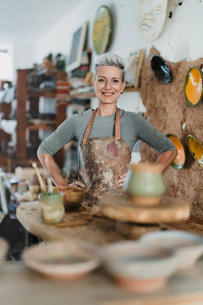 istock Portrait of a smiling female pottery maker 2177546991