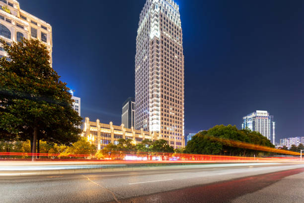 moving car with blur light through city at night