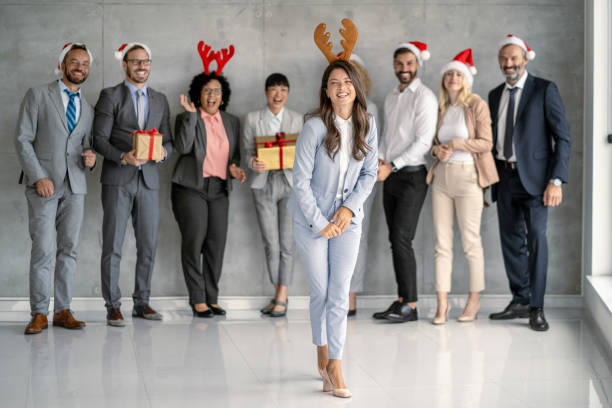 istock Dynamic Business Team Expressing Holiday Cheer with Festive Antics 2177550114