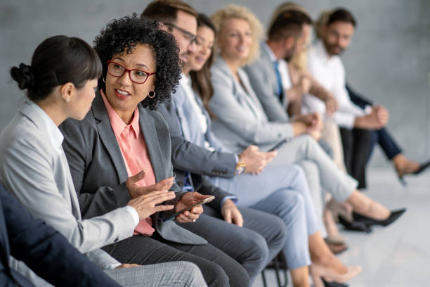 istock Friendly conversation among colleagues during a break at a business event. 2177550197