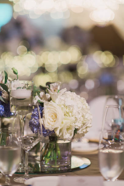 istock luxury color theme wedding solemnisation dinner flower florist , dinnerware banquet, cloth and stage lighting decoration design in premium hotel ballroom and beautiful beach event 2177551029