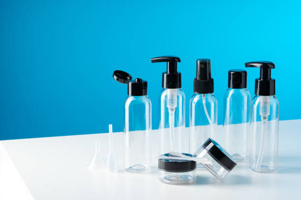 istock Plastic bottles with black caps are neatly arranged on blue background 2177553676