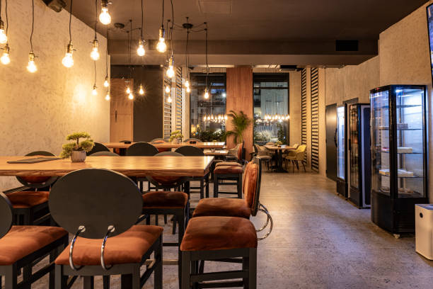 Cozy Modern Cafe Interior with Ambient Lighting and Empty Seating
