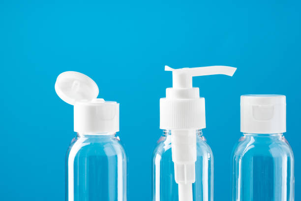 istock Clear plastic bottles with pumps arranged on a table against a bright blue background 2177554441