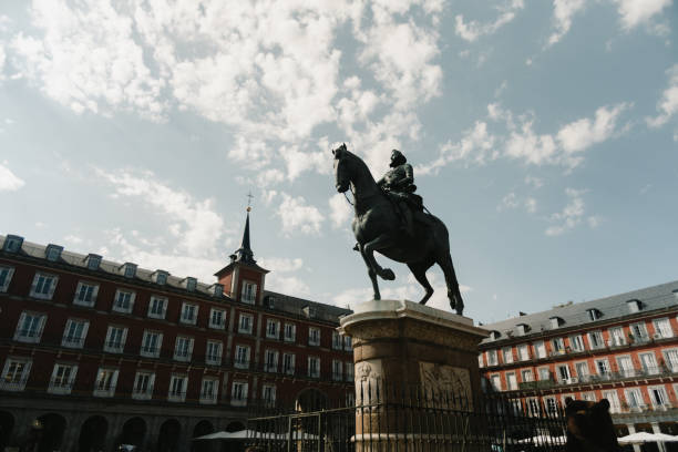 Plaza Mayor with equestrian statue in Madrid\nNote:\nEquestrian statue of King Philip III. This statue was created by the Italian sculptor Giambologna and originally completed in 1616.