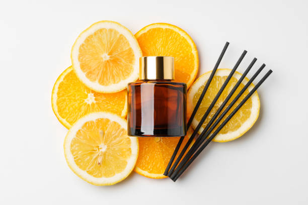 istock Aromatic display of essential oils with citrus fruit and chopsticks on a minimalist background 2177554955