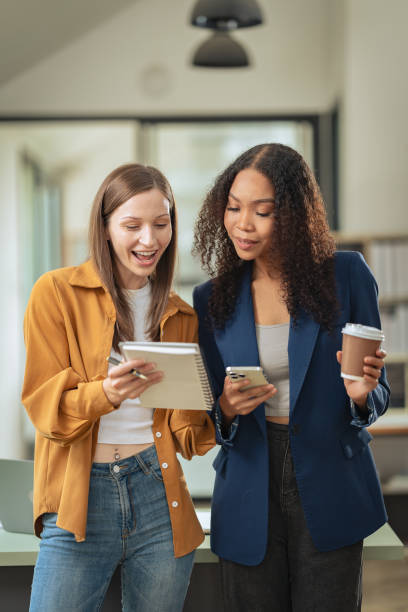 istock Two female colleagues discussing company business work using laptops and their emphatic expressions suggest that they are discussing important business matters. 2177556215