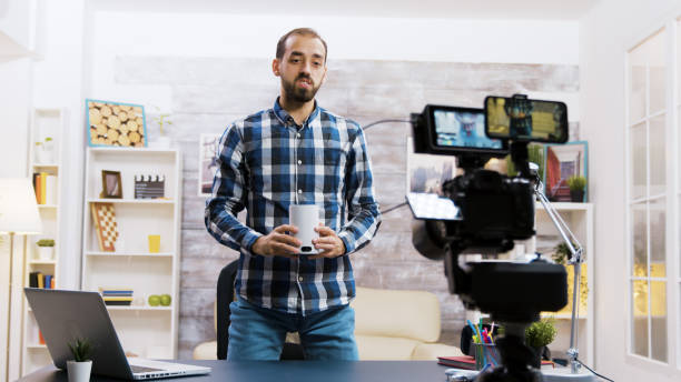 istock Famous influencer talking about new smart speaker in his vlog 2177556749