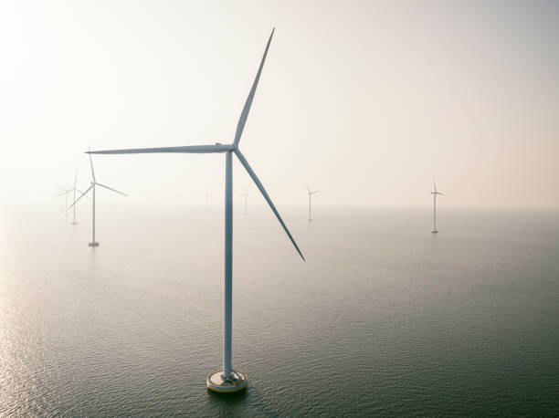istock Wind turbines in an offshore wind park producing electricity 2177557168