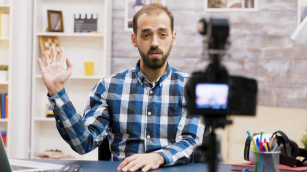 istock Famous young man recording a vlog for subscribers 2177558458