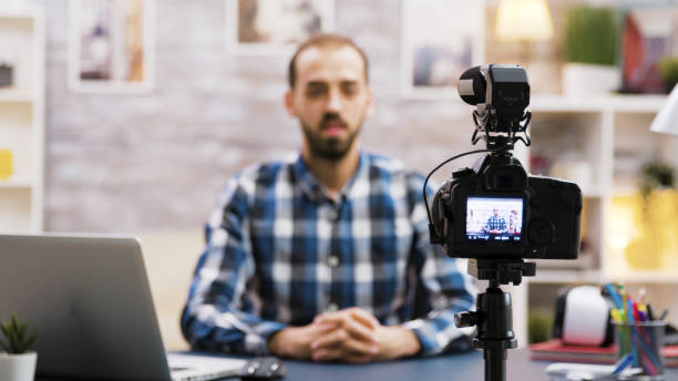 istock Creative young man talking in front of camera 2177558490