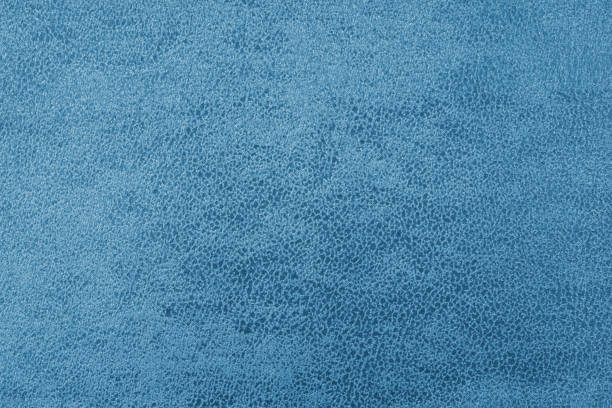 istock Cloth structure of jacquard blue fabric with abstract shabby texture background closeup, macro 2177561034