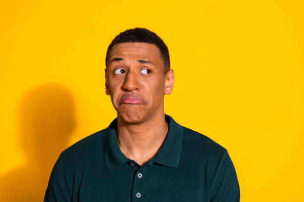 istock Photo of nice young man sullen face look empty space wear pullover isolated on bright yellow color background 2177569032