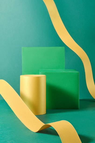 istock These three podiumstwo green rectangular podiums and one yellow cylindrical podiumare perfect for presenting products. Set on a green backdrop and decorated by a flowing yellow ribbon. 2177571435