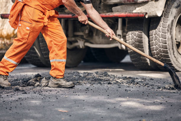 istock Construction workers working on a new asphalt layer on a public street. 2177573166