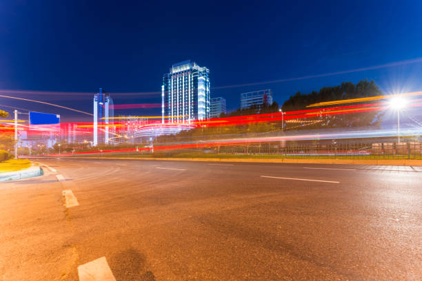 the light trails on the modern building background in shanghai china.