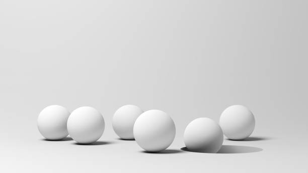 istock Six white spheres. One sphere falling into the hole. Balls. Isolated. 2177576371