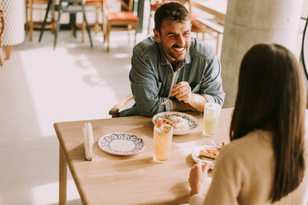 istock A delightful afternoon dessert experience at a cozy cafe shared between two friends enjoying delicious treats and refreshing drinks 2177581475