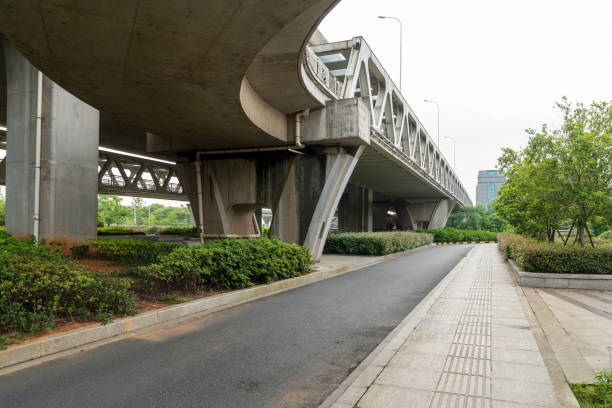 istock Concrete structure and asphalt road space under the overpass in the city 2177581572