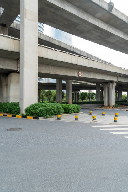 istock Concrete structure and asphalt road space under the overpass in the city 2177581600