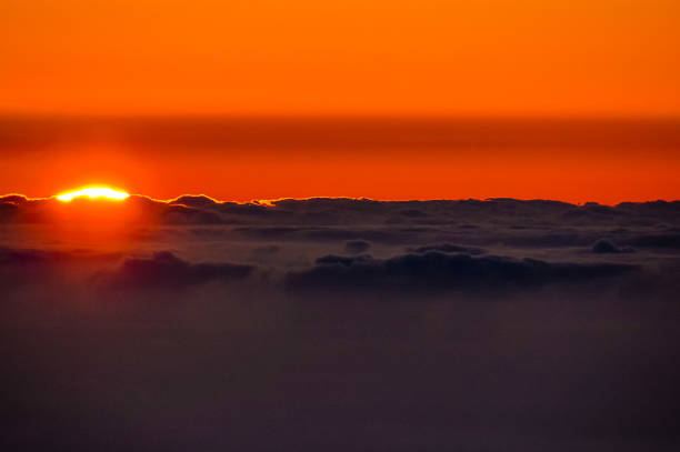 istock The sky is orange and the sun is setting 2177581904