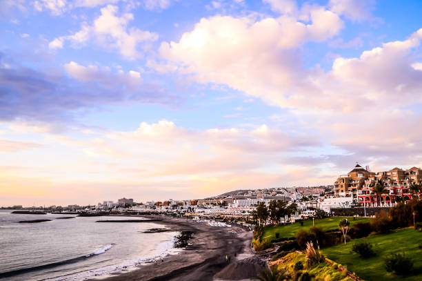 istock A beach with a city in the background 2177581924
