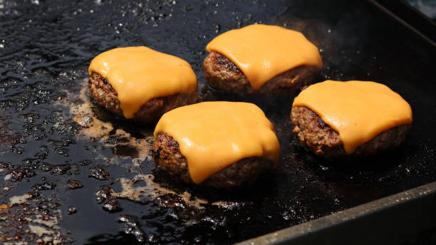 istock Burgers on Grill 2177586423