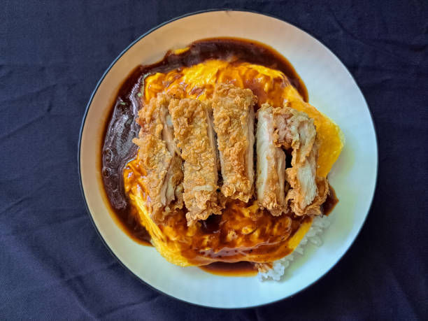 istock Yummy Chicken Egg Chiffon With Steamend Rice, Egg Chiffon, Omurice Sauce And Chicken Cutlet Caramelizend Onion. Food Menu. Top View. 2177587832