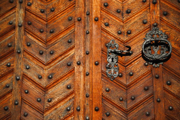 old wooden door with metal studs