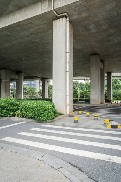 istock Concrete structure and asphalt road space under the overpass in the city 2177589860