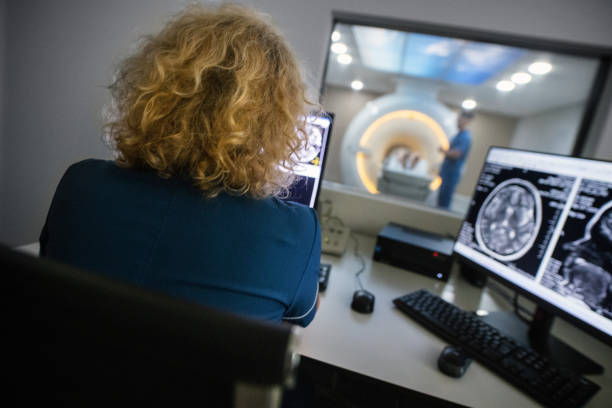 istock Female Radiologist Analyzes the MRI Images. 2177591627