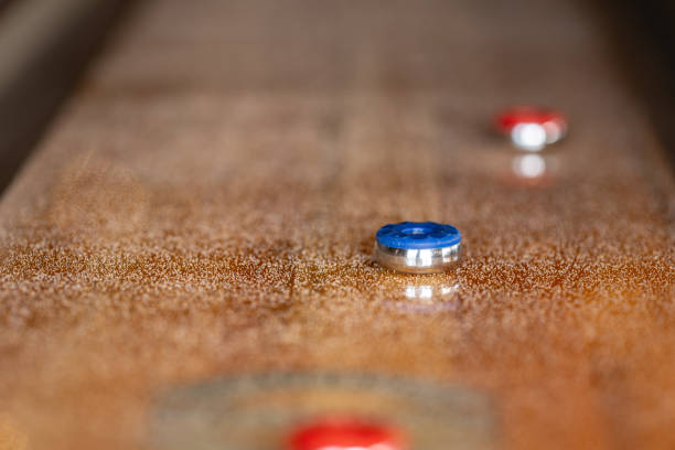 istock Playing a game of shuffleboard.. 2177592544