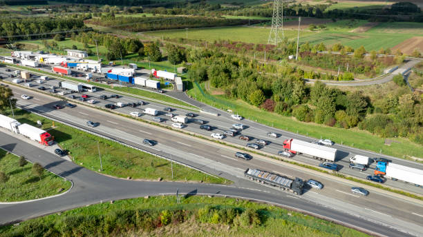istock Multiple lane highway, traffic jam - aerial view 2177600284