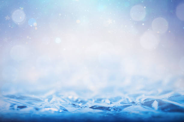 istock Abstract blue background with textured surface and defocused particles in the background. Focal line for product presentation 2177601554
