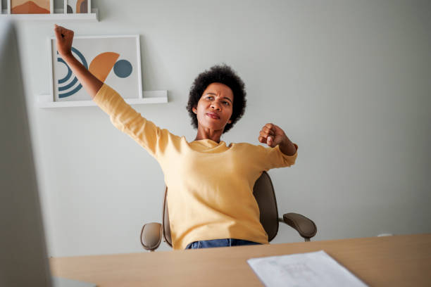 istock Tired businesswoman at office 2177603763