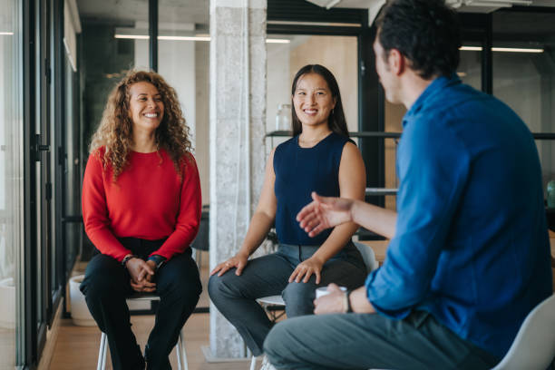 Businesswoman presenting project in meeting room stock photo