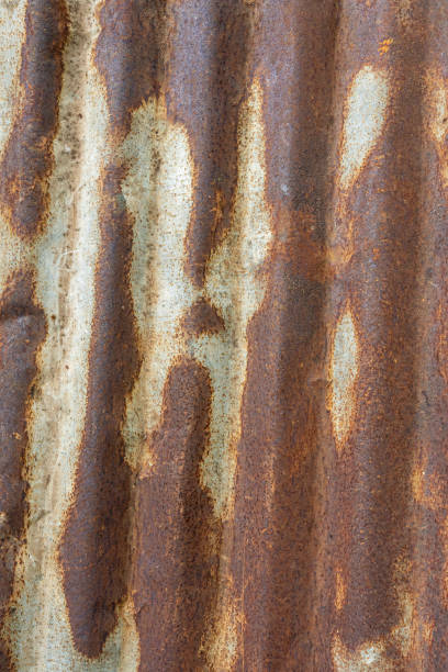 istock Rusty iron wall with textured, weathered surface, grunge pattern, and metallic brown color 2177605255