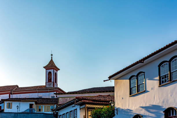 istock Church tower rising among old colonial houses 2177607623