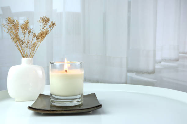 istock luxury scented candles on the nice table in white bedroom creating relax ambient 2177613226