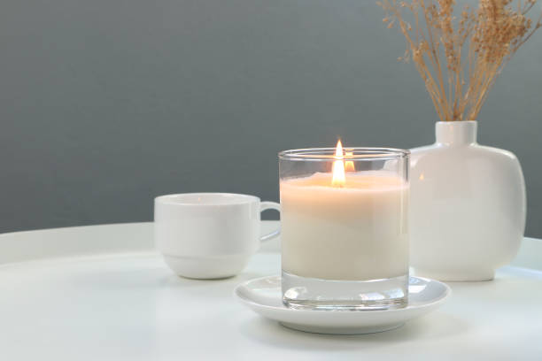 istock luxury scented candles on the nice table in white bedroom creating relax ambient 2177613233