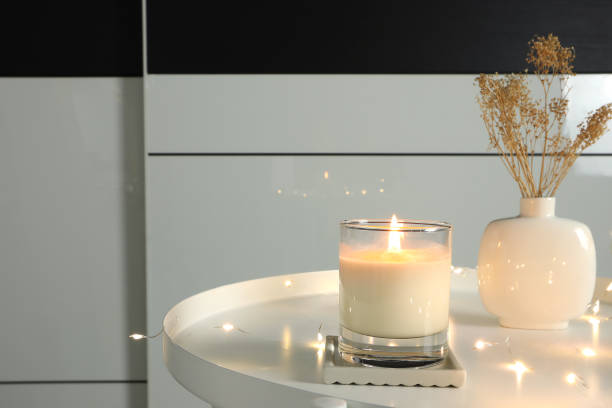 istock luxury scented candles on the nice table in white bedroom creating relax ambient 2177613244
