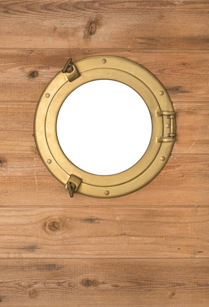 istock Brass porthole in wooden planks 2177614751