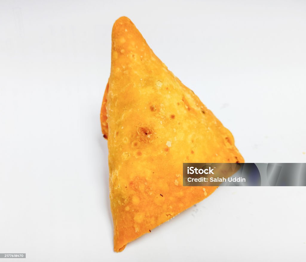 Triangular Asian Food Samosa Is A Spicy Blend Of Vegetables Or Meat Wrapped In A Deepfried ...
