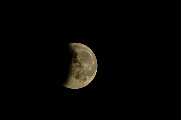istock A large moon is in the sky, shining brightly against the dark background 2177619767
