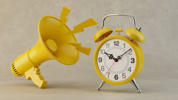istock Vintage Alarm Clock Next to Megaphone: Symbolizing Urgency and Communication. 3D Rendering 2177622714