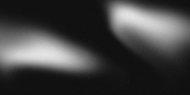 istock Noisy color gradient background grainy. Monochrome noise texture abstract black and white gradient with soft blur. banner, poster header backdrop design. 2177623563
