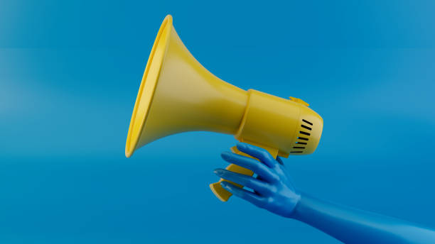 istock Yellow megaphone with a blue hand on a bright blue background, surreal and attention-grabbing advertising concept, minimalist design, pop art style, bold visual, 3D render with high-resolution detail. 2177624583