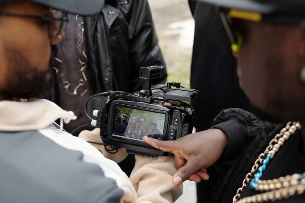 istock Reviewing Shot on Digital Camera During Outdoor Shoot 2177626148